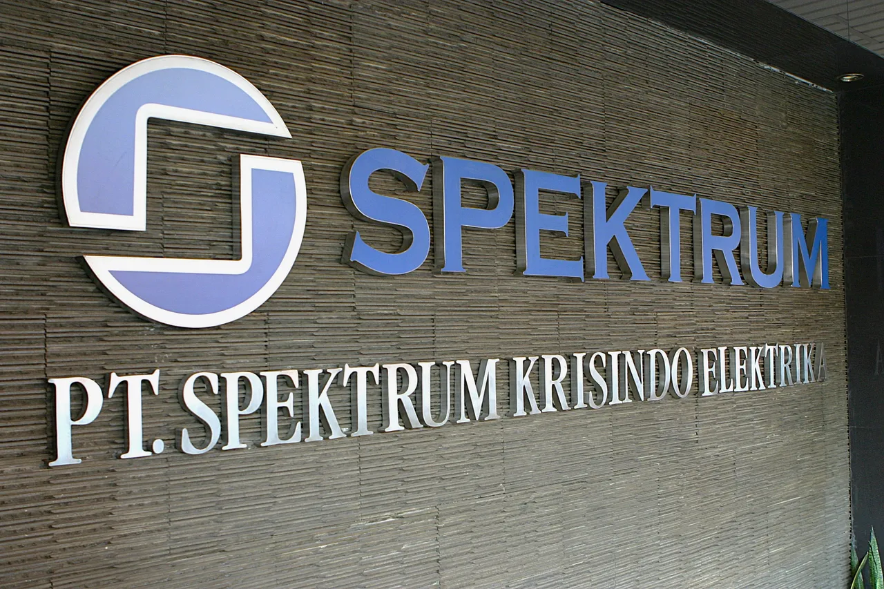 Technicians assembling electrical panels at Spektrum Krisindo Elektrika